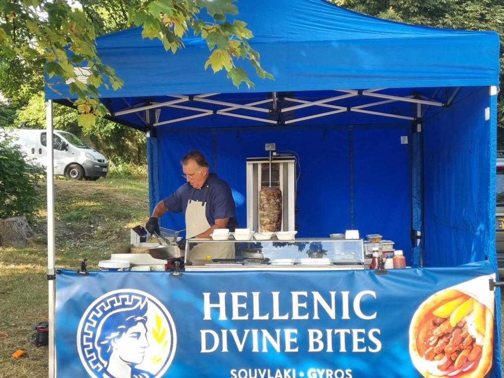 Side view of the professional Hellenic Divine Bites mobile catering unit.
